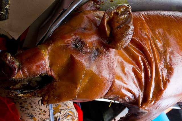A Balinese sucking pig lies ready for dissection at Ibu Oka in Ubud, Bali.