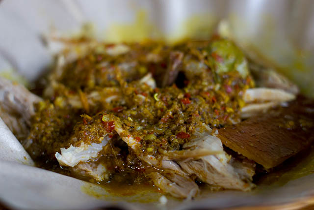 Babi guling meat, skin and sauce at Ibu Oka in Ubud, Bali.