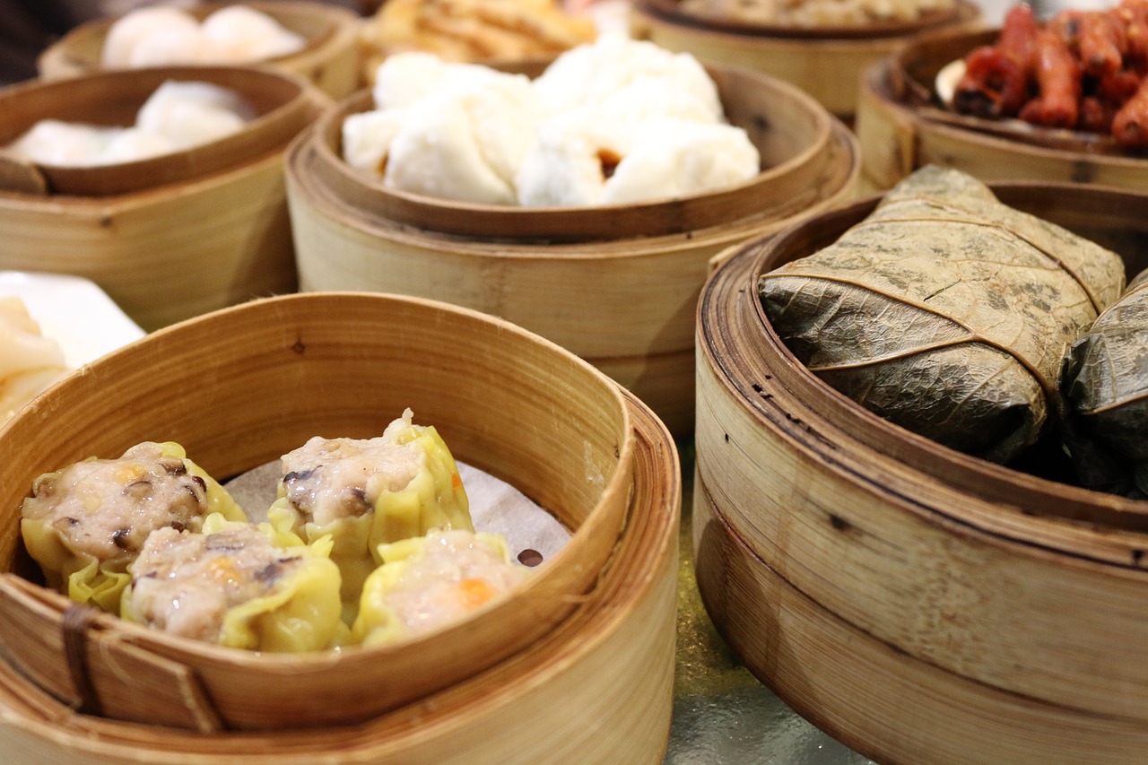 Dim sum dumplings in traditional steamers.