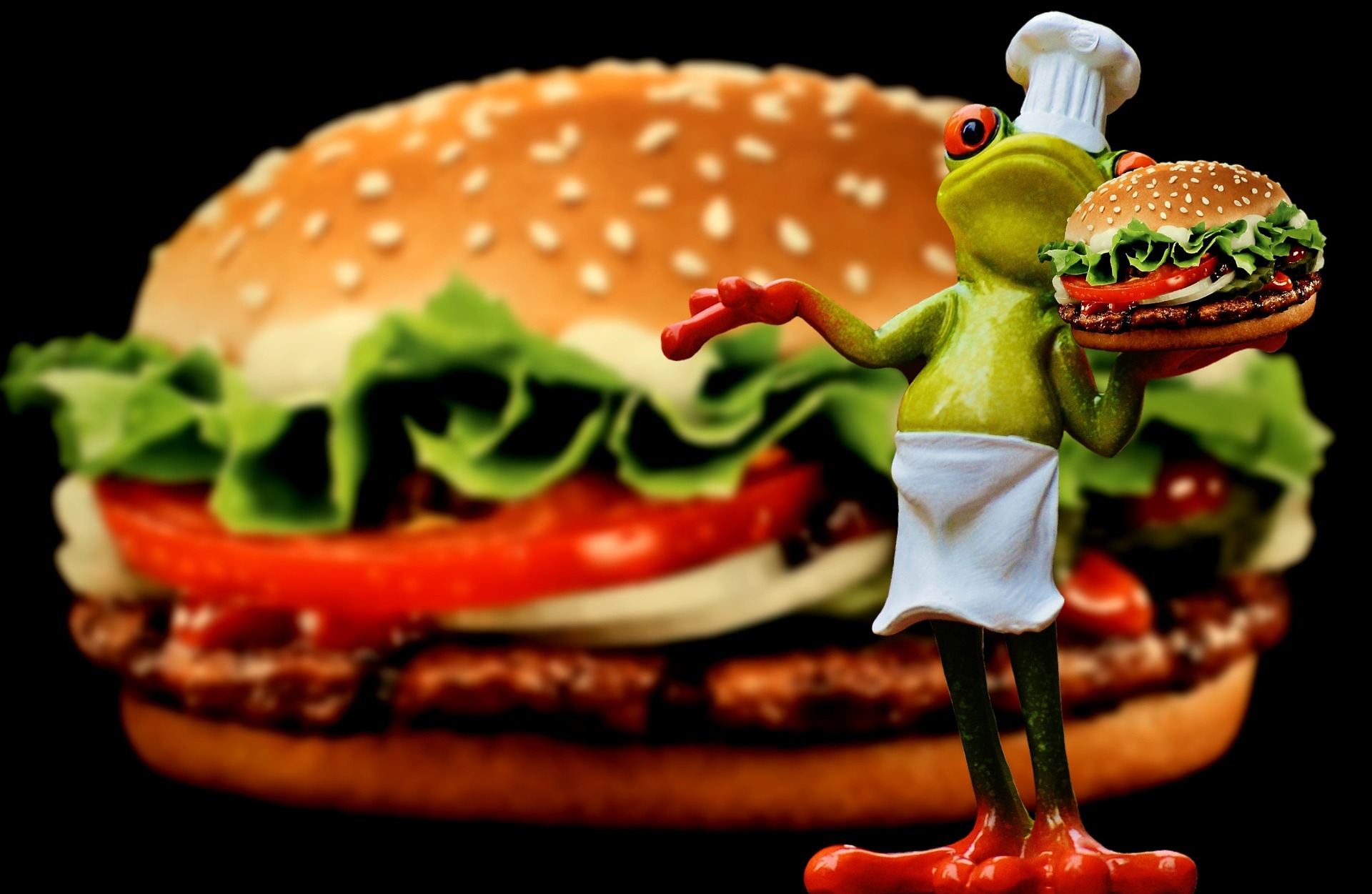 Hamburger with dancing frog in chef's skirt